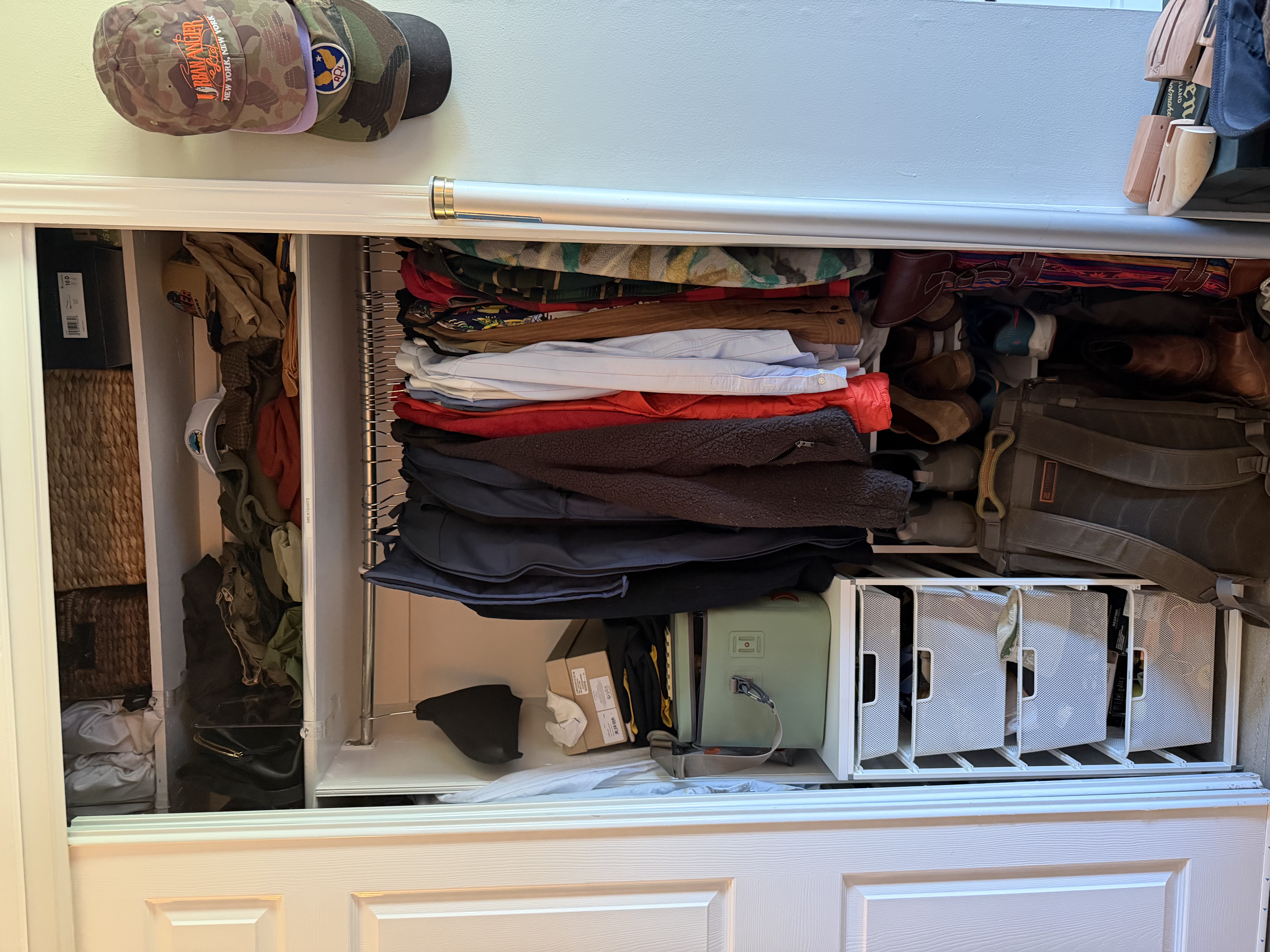 Reach-in bedroom closet before organizing
